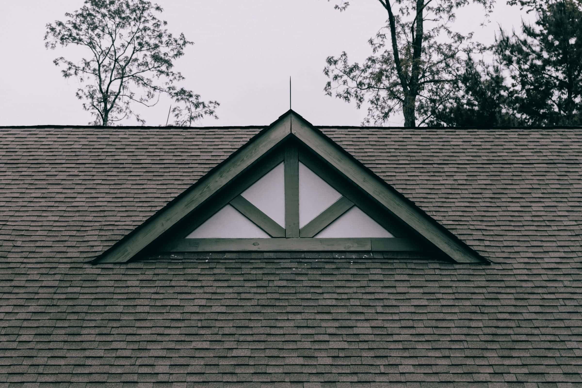 Shingle roof with a decorative gable vent